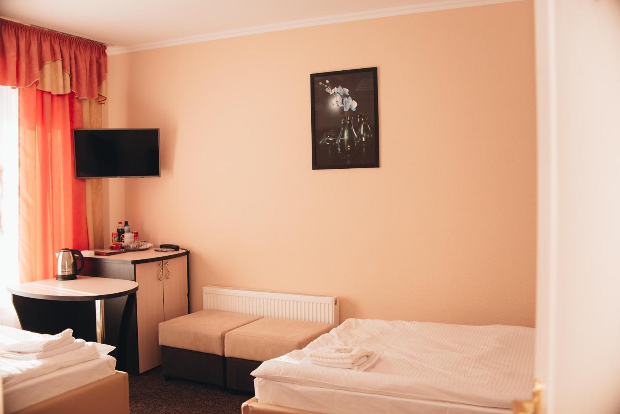 Орхідея Hotel Romny Eksteriør billede